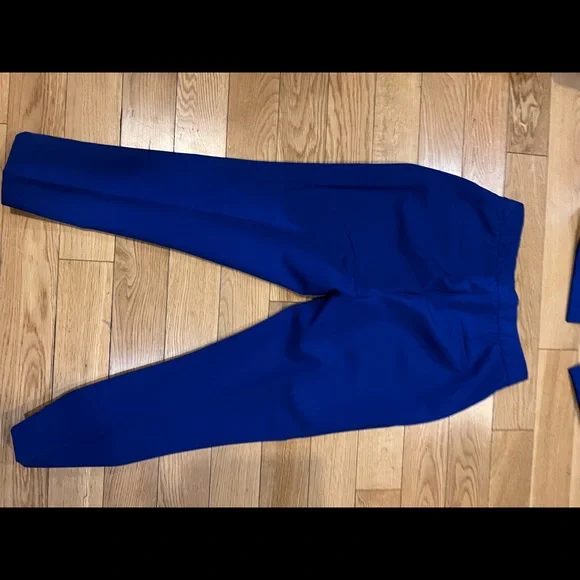 This is a blue suit comes with blazer and pants. It is an XS. - Picture 2 of 10